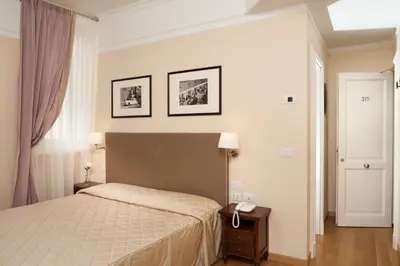 Letto o letti in una camera di Hotel Executive