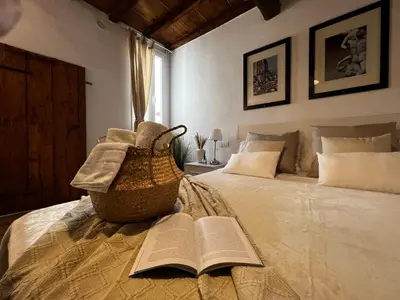 Letto o letti in una camera di A casa di Anna