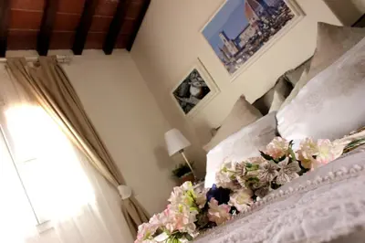 Letto o letti in una camera di La Torre di Anna
