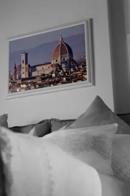 Letto o letti in una camera di La Torre di Anna