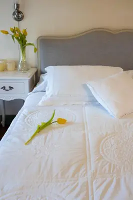Letto o letti in una camera di Casa Palmira