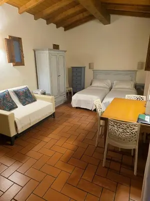 Letto o letti in una camera di Lebbiano Residence