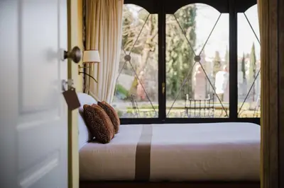 Letto o letti in una camera di Residenza Il Colle