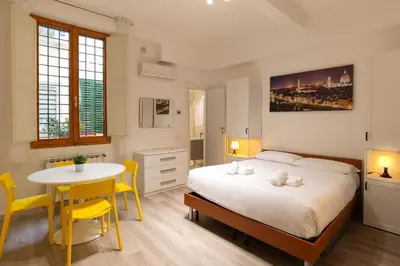 Letto o letti in una camera di Santa Croce Sweet Apartment