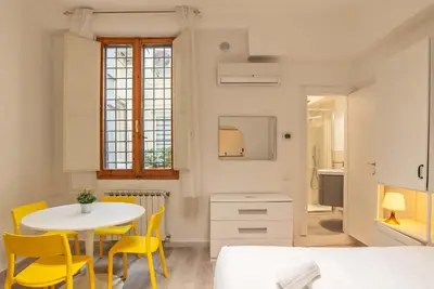 Letto o letti in una camera di Santa Croce Sweet Apartment
