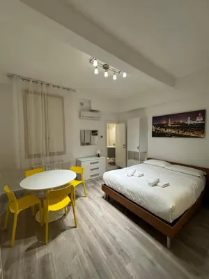 Letto o letti in una camera di Santa Croce Sweet Apartment