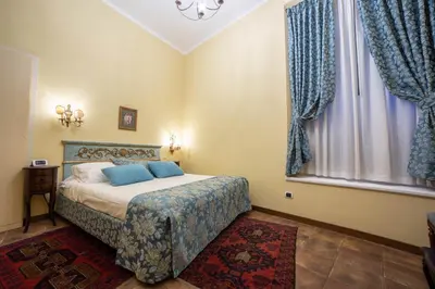 Letto o letti in una camera di B&B Galileo 2000