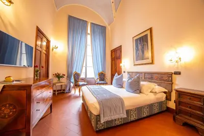 Letto o letti in una camera di B&B Galileo 2000