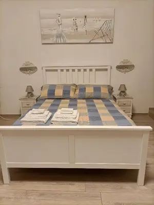 Letto o letti in una camera di Affittacamere Il Chiostrino Guest House