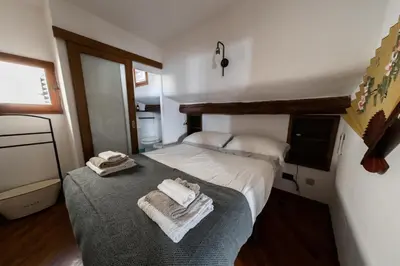 Letto o letti in una camera di TINA’S APARTMENT