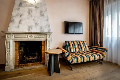 TV o dispositivi per l'intrattenimento presso Florence Old Bridge B&B