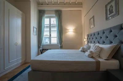 Letto o letti in una camera di The Cathedral Of Florence