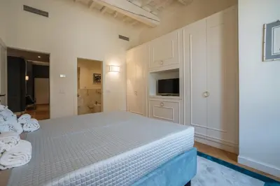 Letto o letti in una camera di The Cathedral Of Florence