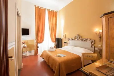 Letto o letti in una camera di Residenza Vespucci