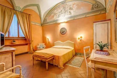 Letto o letti in una camera di Firenze Suite