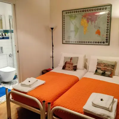 Letto o letti in una camera di BB Tre Gigli Firenze stazione, via Palazzuolo 55