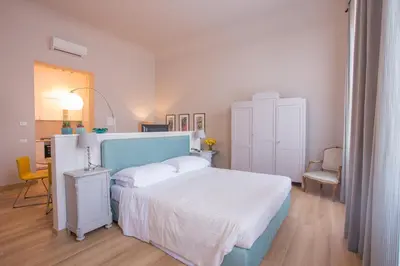 Letto o letti in una camera di Palazzo Alfani - Residenza d'Epoca