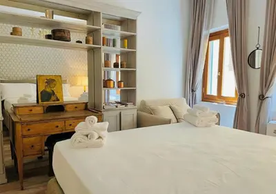 Letto o letti in una camera di Santa Maria Novella apt