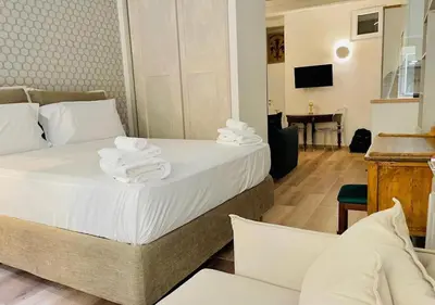 Letto o letti in una camera di Santa Maria Novella apt