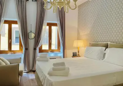 Letto o letti in una camera di Santa Maria Novella apt