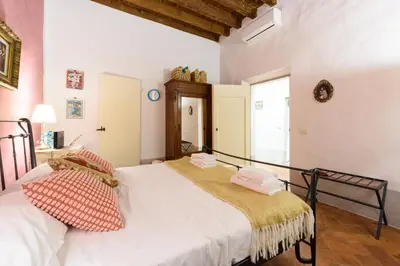 Letto o letti in una camera di Santo Spirito Dream by Mmega