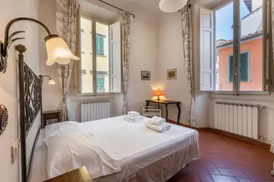 Letto o letti in una camera di Casa Ghibellina by Mmega