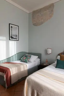Letto o letti in una camera di Hotel Galileo