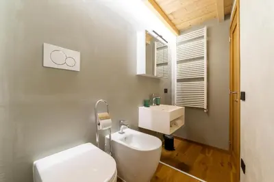 Bagno di Industrial design loft with outdoor living terrace