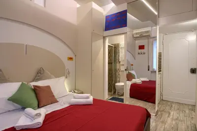Letto o letti in una camera di La Chicca Pontevecchio