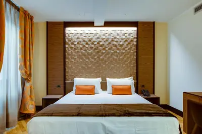 Letto o letti in una camera di Solo Experience Hotel