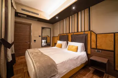 Letto o letti in una camera di Solo Experience Hotel