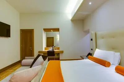 Letto o letti in una camera di Solo Experience Hotel