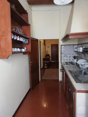 Cucina o angolo cottura di La Rosa Townhouse