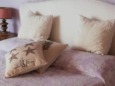 Letto o letti in una camera di La Rosa Townhouse