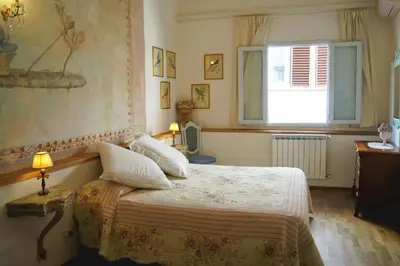 Letto o letti in una camera di Melarancio Apartments