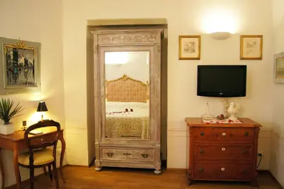 TV o dispositivi per l'intrattenimento presso Melarancio Apartments