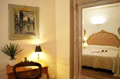 Letto o letti in una camera di Melarancio Apartments