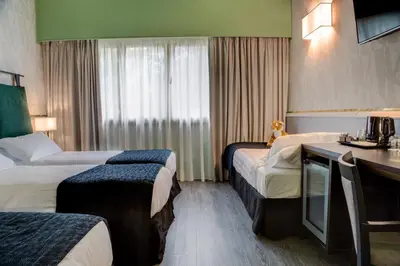 Letto o letti in una camera di Best Western Plus CHC Florence