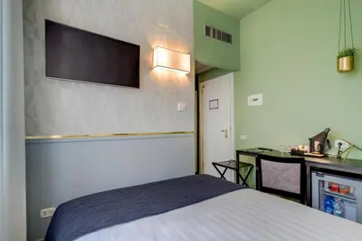 Letto o letti in una camera di Best Western Plus CHC Florence