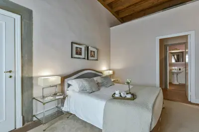 Letto o letti in una camera di Boccaccio elegant apartment in Oltrarno