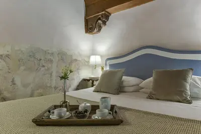 Letto o letti in una camera di Caravaggio frescoed big loft in Oltrarno