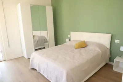 Letto o letti in una camera di Santa Maria Novella - Golden Lily Florence, city center apartment