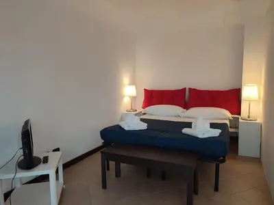Letto o letti in una camera di Leopolda Suite