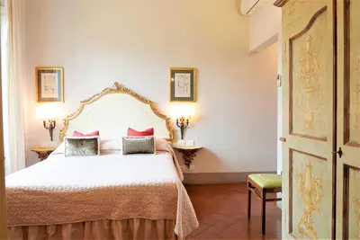 Letto o letti in una camera di Relais Cavalcanti Guest House