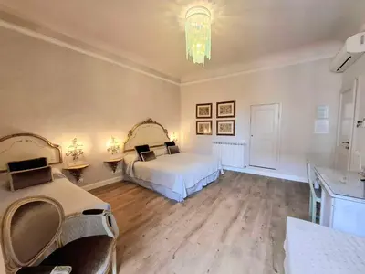 Letto o letti in una camera di Relais Cavalcanti Guest House