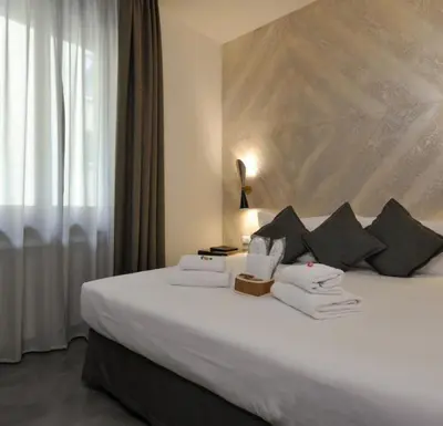 Letto o letti in una camera di Hotel Lungarno Vespucci 50