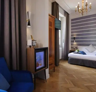 Letto o letti in una camera di Hotel Lungarno Vespucci 50