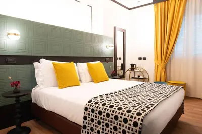 Letto o letti in una camera di JOIVY Together Florence Urban Resort