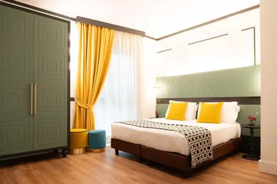 Letto o letti in una camera di JOIVY Together Florence Urban Resort