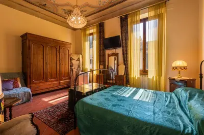 Letto o letti in una camera di Monna Lisa by Mmega